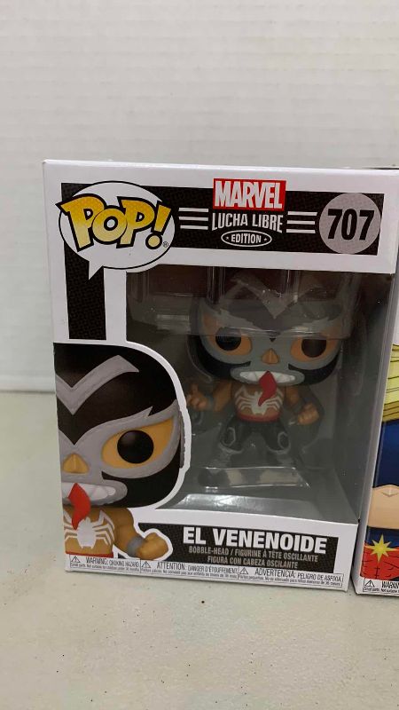 Photo 1 of FUNKO POP MARVEL EL VENENOIDE 707, AND CAPTAIN MAVEL (MAR-VELL) #526