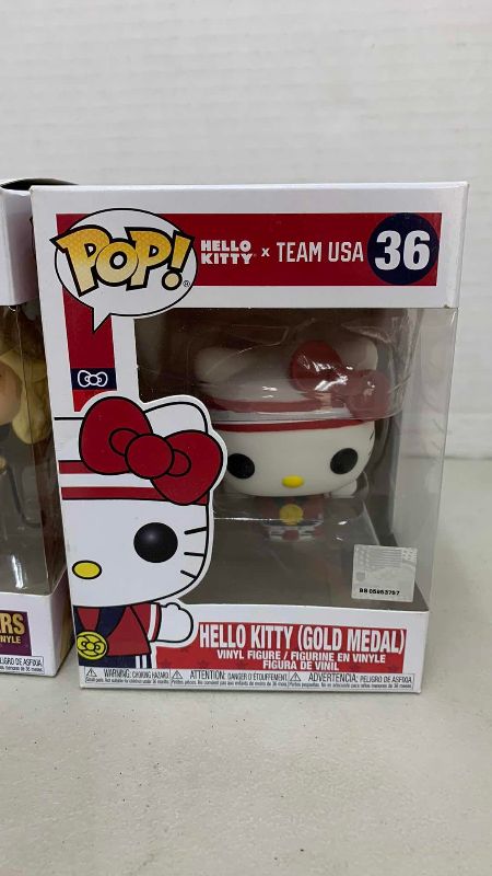 Photo 1 of FUNKO POP BRITNEY SPEARS # 262, AND HELLO KITTY GOLD MEDAL # 36