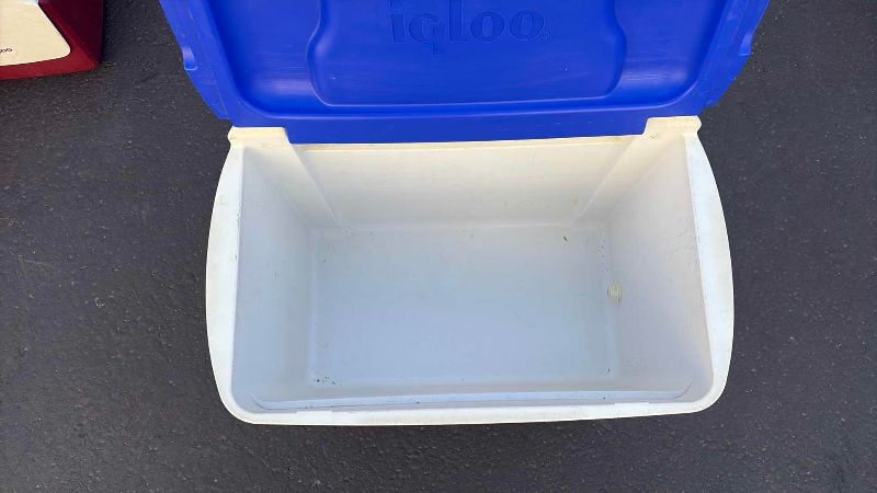 Photo 1 of IGLOO COOLER SILVER AND BLUE 26” X 15” X 16”