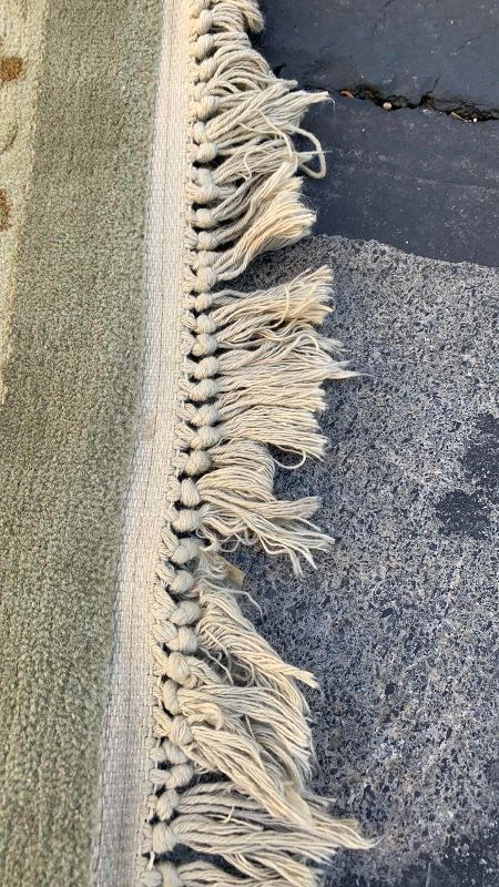 Photo 1 of WOOL RUG 7'10' X 11' 
