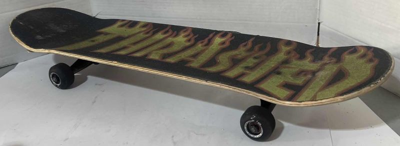 Photo 1 of THRASHER SKATEBOARD