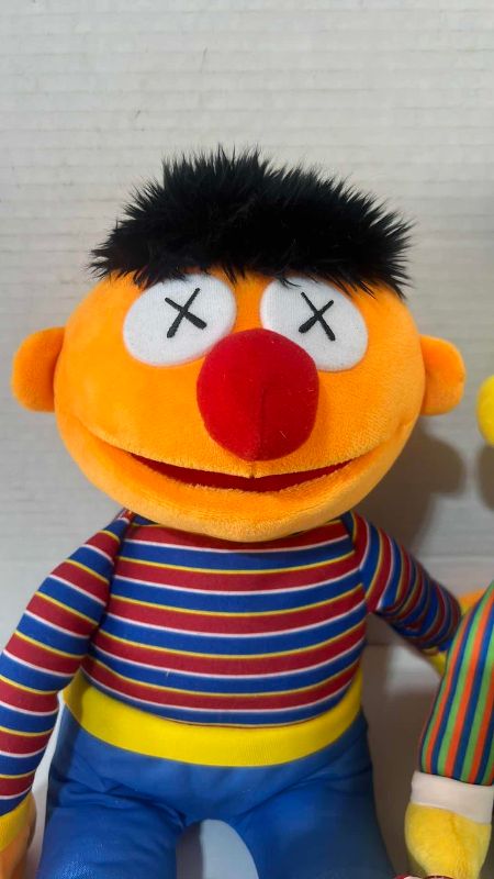 Photo 1 of KAWS X UNIQLO SESAME STREET MODIFIED BERT AND ERNIE DOLLS WITH ORIGINAL TAGS