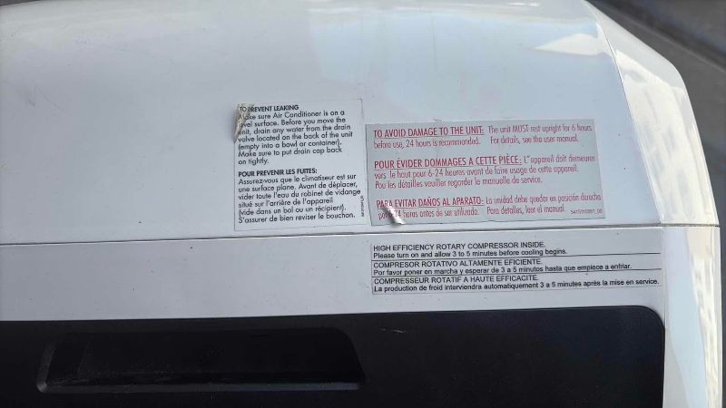 Photo 1 of DELONGHI PINGUINO PORTABLE AIR CONDITIONER 16”X 12”X 29”H ATTACHMENTS COVER AND REMOTE
