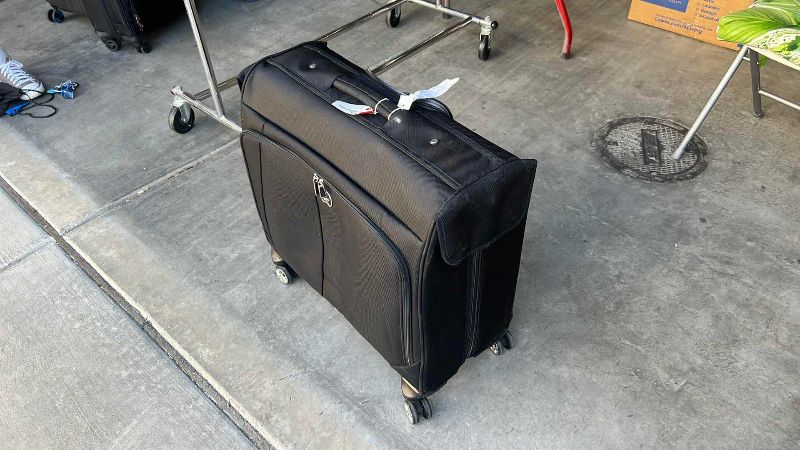 Photo 1 of BLACK DELSEY SUITCASE 23” X 9” H 20”