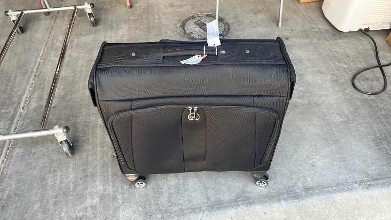 Photo 1 of BLACK DELSEY SUITCASE 23” X 9” H 20”