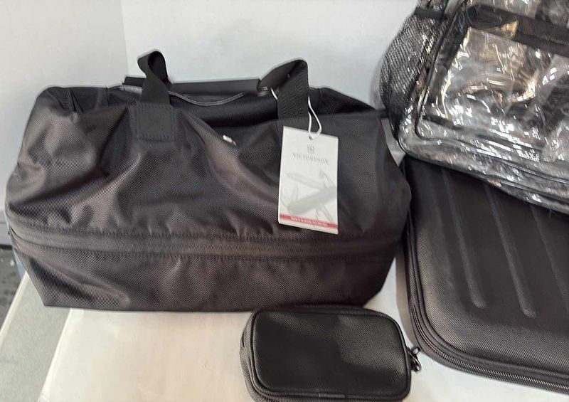 Photo 1 of TRAVEL BAGS AND TOTES