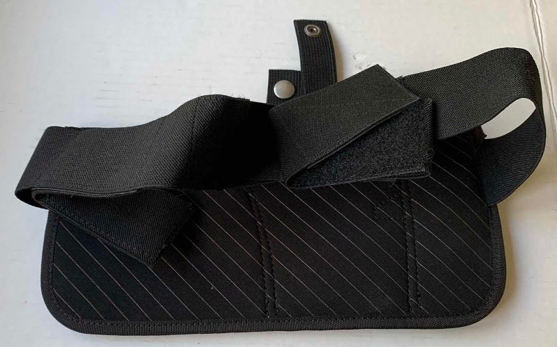 Photo 1 of CONCEALED CARRY HOLSTER WRAP AND 1 HOLSTER