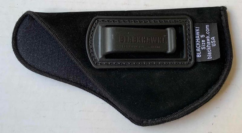 Photo 1 of CONCEALED CARRY HOLSTER WRAP AND 1 HOLSTER