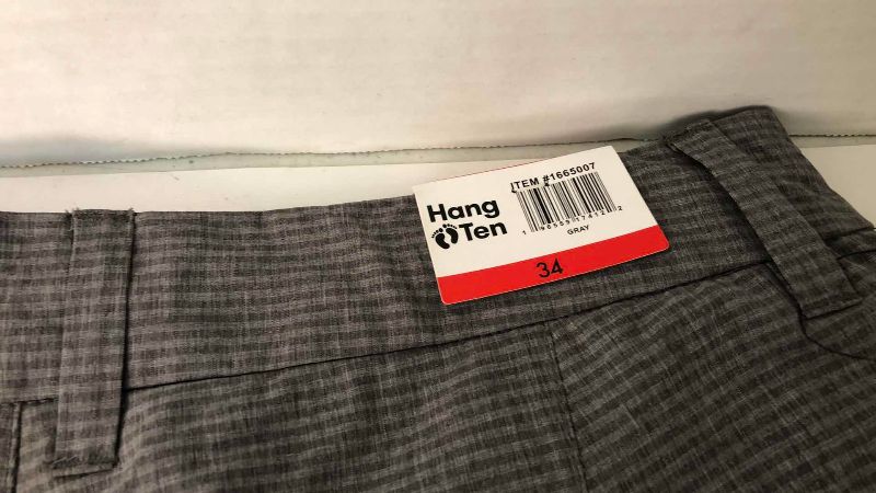 Photo 1 of HANG TEN BOARD SHORTS SIZE 34