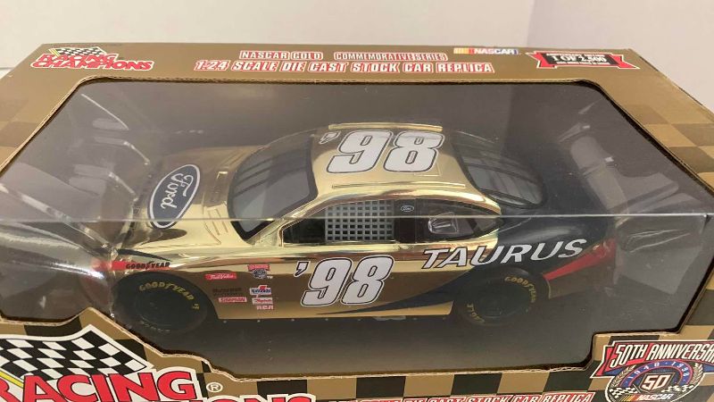 Photo 1 of NASCAR 50TH ANNIVERSARY FORD TAURUS NUMBER 98 RACING CHAMPIONS 1/24 SCALE DIECAST STOCK CAR BANK 1/2500