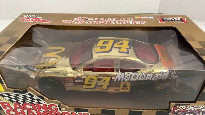 Photo 1 of NASCAR 50TH ANNIVERSARY BILL ELLIOTT NUMBER 94 RACING CHAMPIONS 1/24 SCALE DIECAST STOCK CAR BANK 1/2500