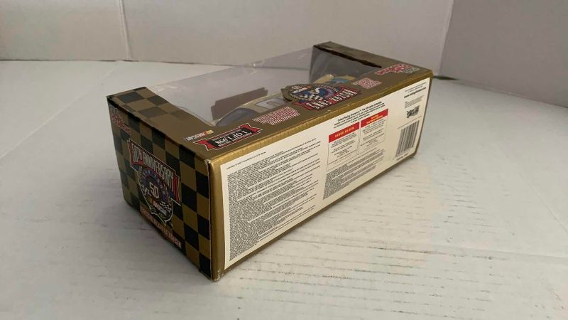 Photo 1 of NASCAR FANS 50TH ANNIVERSARY RICKY RUDD NUMBER 10 RACING CHAMPIONS 1/24 SCALE DIECAST STOCK CAR 1/1998