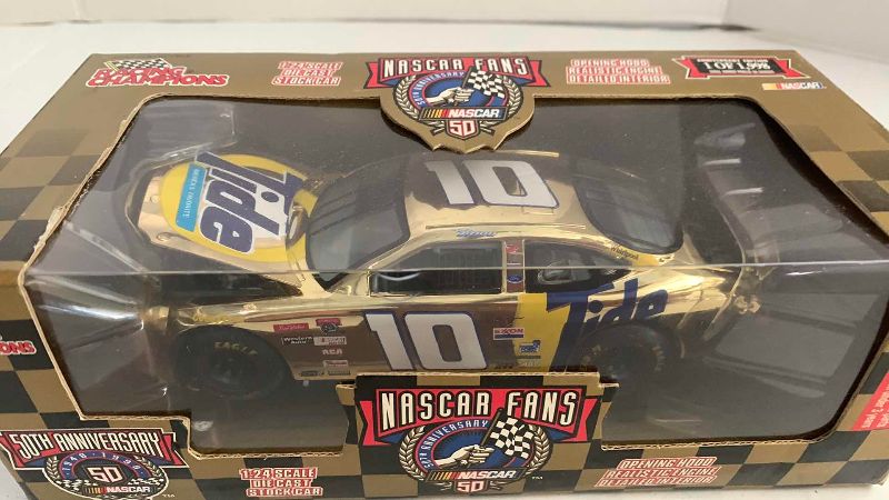 Photo 1 of NASCAR FANS 50TH ANNIVERSARY RICKY RUDD NUMBER 10 RACING CHAMPIONS 1/24 SCALE DIECAST STOCK CAR 1/1998