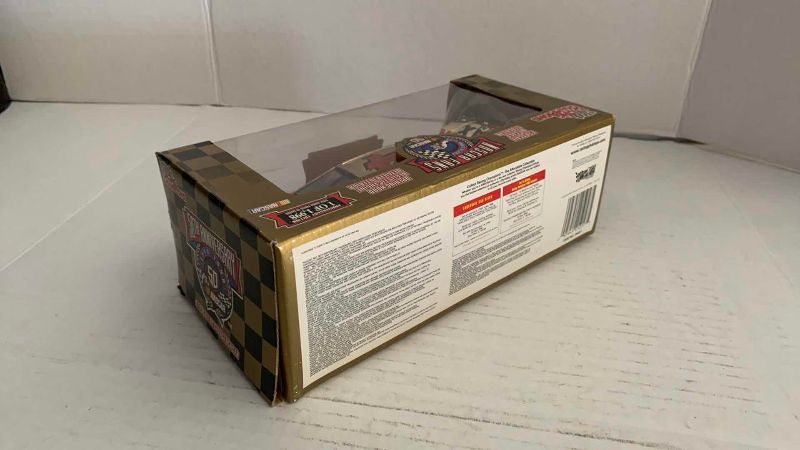 Photo 1 of NASCAR FANS 50TH ANNIVERSARY BOBBY HAMILTON NUMBER 4 RACING CHAMPIONS 1/24 SCALE DIECAST STOCK CAR 1/1998