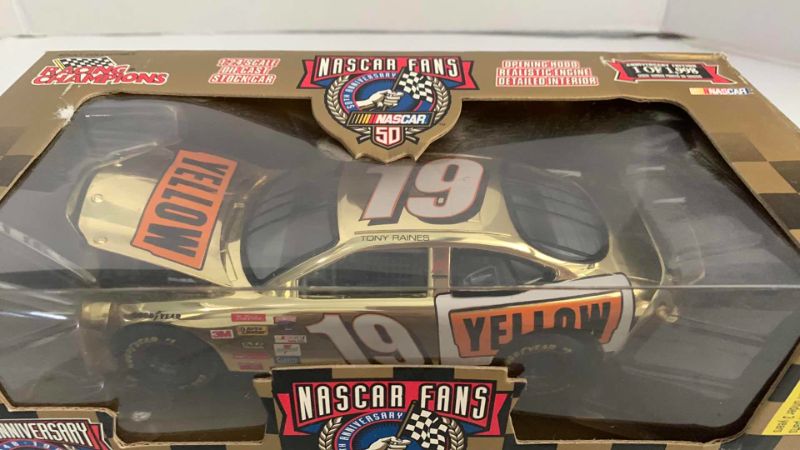 Photo 1 of NASCAR FANS 50TH ANNIVERSARY TONY RAINES NUMBER 19 RACING CHAMPIONS 1/24 SCALE DIECAST STOCK CAR 1/1998
