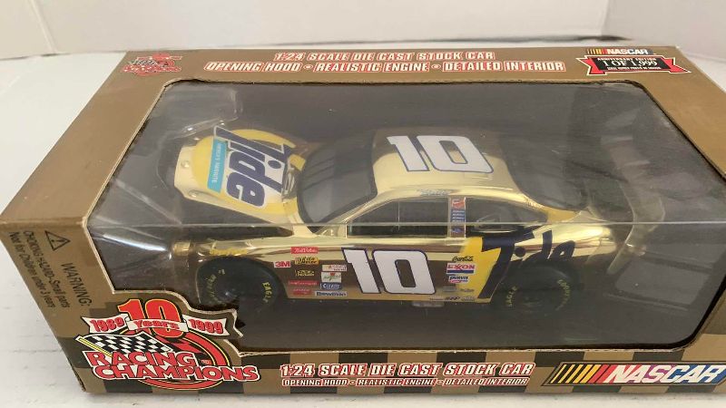 Photo 1 of NASCAR 10TH ANNIVERSARY RACING CHAMPIONS RICKY RUDD NUMBER 10 1/24 SCALE DIECAST STOCK CAR 1/1999