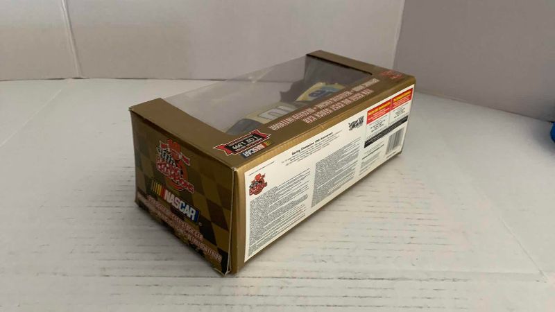 Photo 1 of NASCAR 10TH ANNIVERSARY RACING CHAMPIONS RICKY RUDD NUMBER 10 1/24 SCALE DIECAST STOCK CAR 1/1999