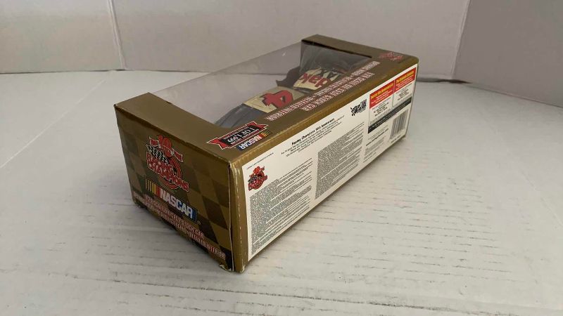 Photo 1 of NASCAR 10TH ANNIVERSARY RACING CHAMPIONS BOBBY HAMILTON NUMBER 4 1/24 SCALE DIECAST STOCK CAR 1/1999