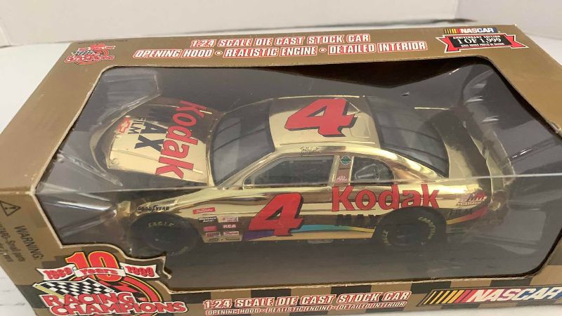 Photo 1 of NASCAR 10TH ANNIVERSARY RACING CHAMPIONS BOBBY HAMILTON NUMBER 4 1/24 SCALE DIECAST STOCK CAR 1/1999