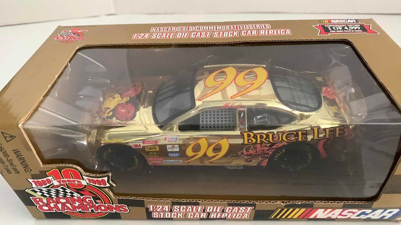 Photo 1 of NASCAR 10TH ANNIVERSARY RACING CHAMPIONS JEFF BURTON NUMBER 99 1/24 SCALE DIECAST STOCK CAR 1/1999
