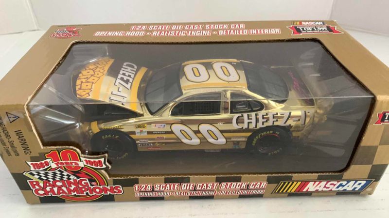 Photo 1 of NASCAR 10TH ANNIVERSARY RACING CHAMPIONS LARRY PEARSON NUMBER 00 1/24 SCALE DIECAST STOCK CAR 1/1999