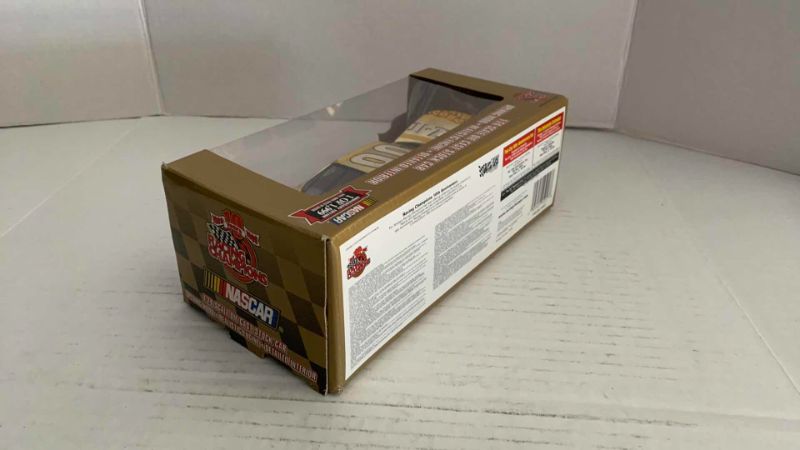 Photo 1 of NASCAR 10TH ANNIVERSARY RACING CHAMPIONS LARRY PEARSON NUMBER 00 1/24 SCALE DIECAST STOCK CAR 1/1999