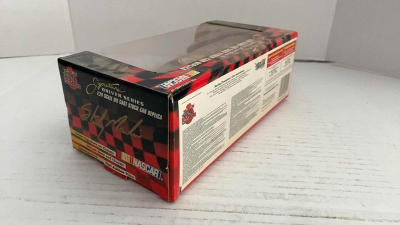 Photo 1 of NASCAR 50TH ANNIVERSARY RACING CHAMPIONS SIGNATURE DRIVER SERIES STERLING MARLIN NUMBER 40 1/24TH SCALE DIECAST STOCK CAR REPLICA