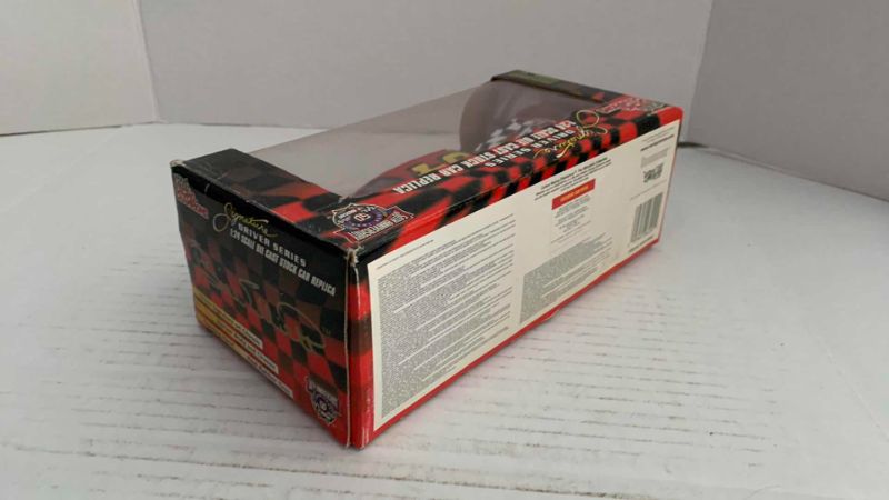 Photo 1 of NASCAR 50TH ANNIVERSARY RACING CHAMPIONS SIGNATURE DRIVER SERIES BILL ELLIOTT NUMBER 94 1/24TH SCALE DIECAST STOCK CAR REPLICA
