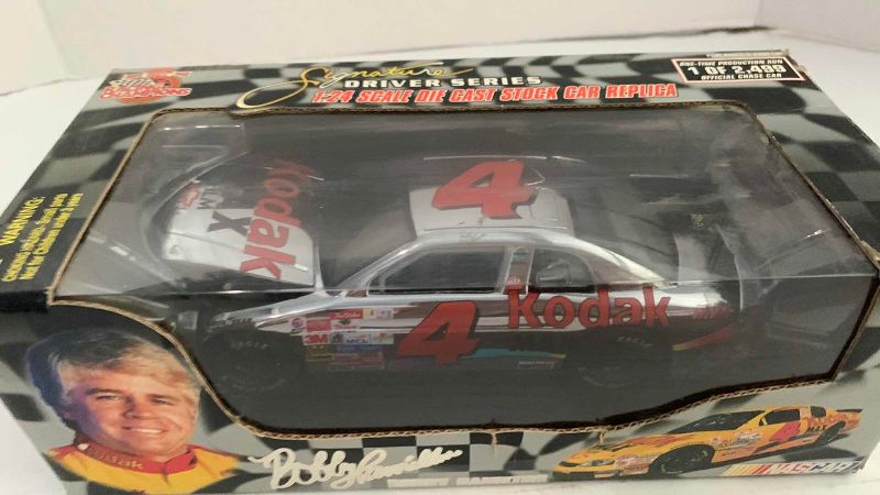 Photo 1 of NASCAR RACING CHAMPIONS 10TH ANNIVERSARY SIGNATURE DRIVER SERIES BOBBY HAMILTON NUMBER 4 1/24 SCALE DIECAST STOCK CAR REPLICA 1/2499
