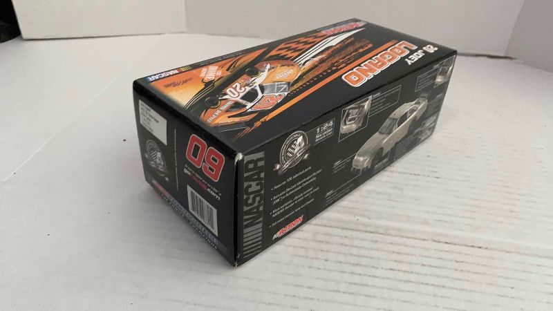 Photo 1 of NASCAR ACTION RACING COLLECTIBLES JOEY LOGANO NUMBER 21/24 SCALE STOCK CAR 1/6701