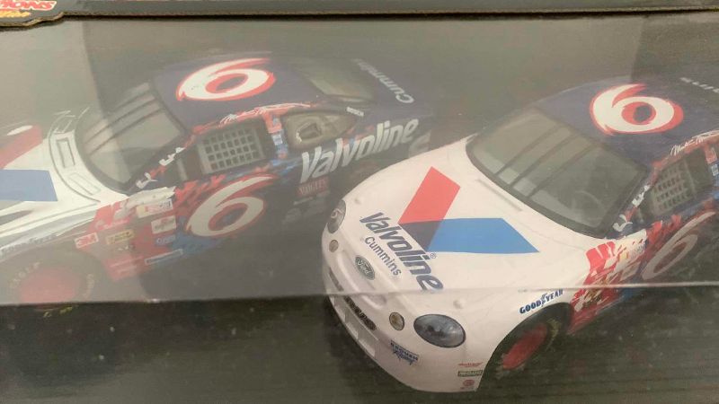 Photo 1 of NASCAR RACING CHAMPIONS 10TH ANNIVERSARY MARK MARTIN NUMBER 6 1/64 SCALE TRANSPORTER WITH 164 AND ONE 24 SCALE STOCK CAR 1/5000