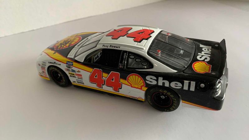Photo 1 of NASCAR TONY STEWART NUMBER 44 AUTOGRAPHED CAR 124 SCALE