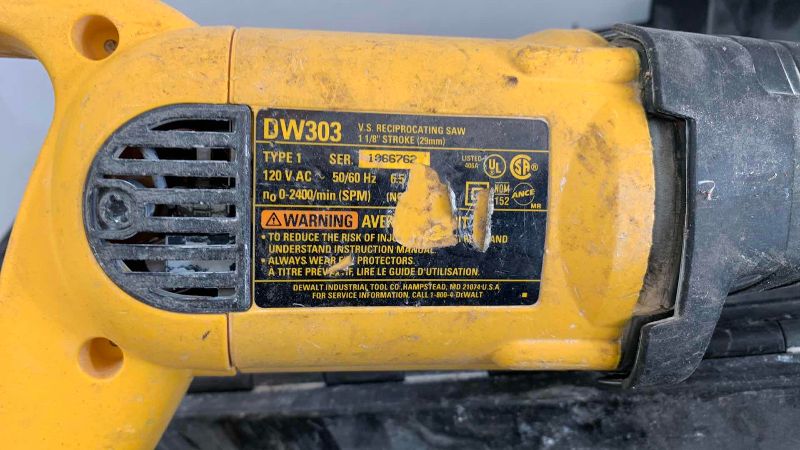 Photo 1 of DEWALT SAWZALL DW303 WITH BLADES