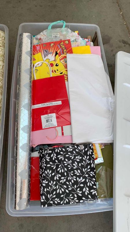 Photo 1 of 2-TOTES OF CHRISTMAS WRAP