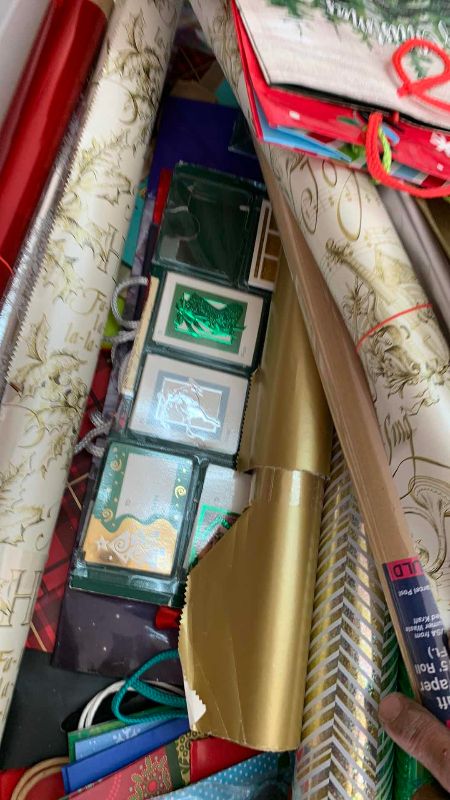 Photo 1 of 2-TOTES OF CHRISTMAS WRAP