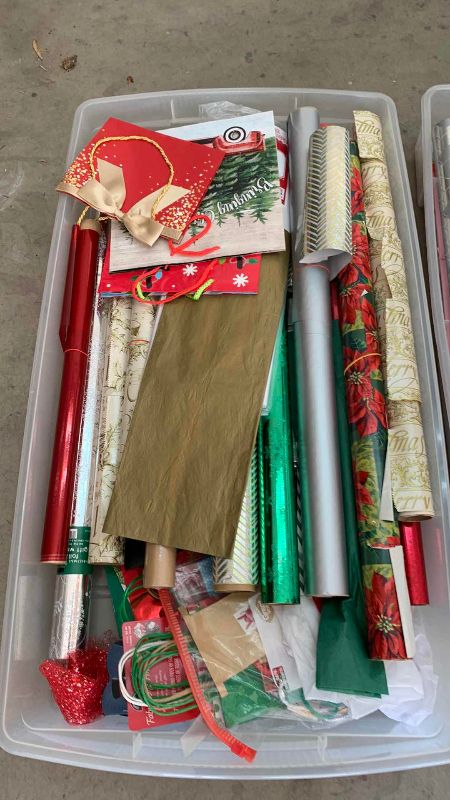 Photo 1 of 2-TOTES OF CHRISTMAS WRAP