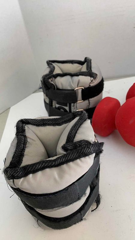 Photo 1 of LEG WEIGHTS AND 3-DUMBBELL SETS 4,8,10 POUNDS