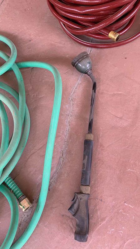 Photo 1 of 2-GARDEN HOSES WITH ATTACHMENTS
