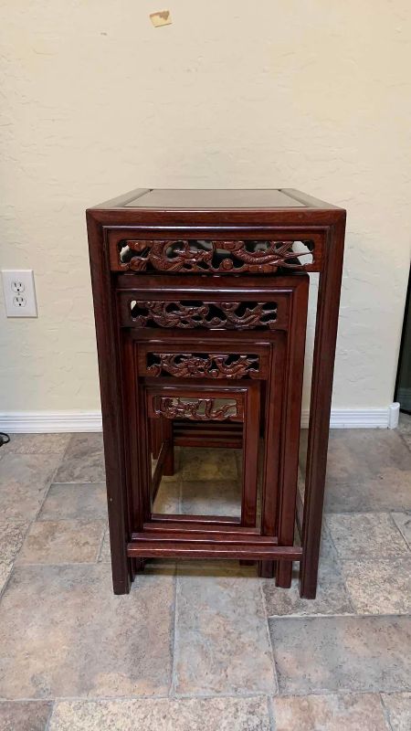 Photo 1 of HAND CARVED ASIAN WOOD NESTING TABLES STACKING TABLES SET OF 4 20” X 14” H X 26”