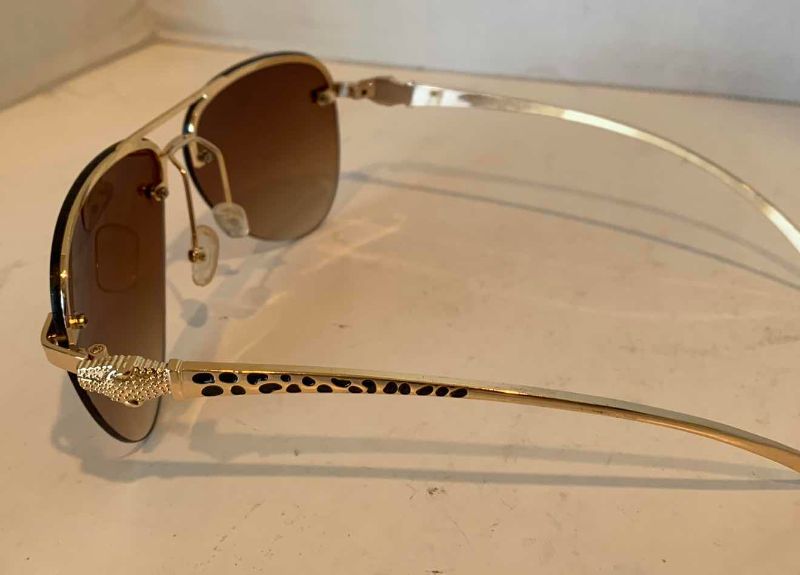 Photo 1 of GOLD AND BROWN AVIATORS WITH PANTHER DETAIL ON THE SIDE