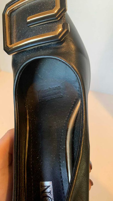Photo 1 of BLACK PUMP WITH GOLD “G” EMBLEMS SIZE NOT FOUND