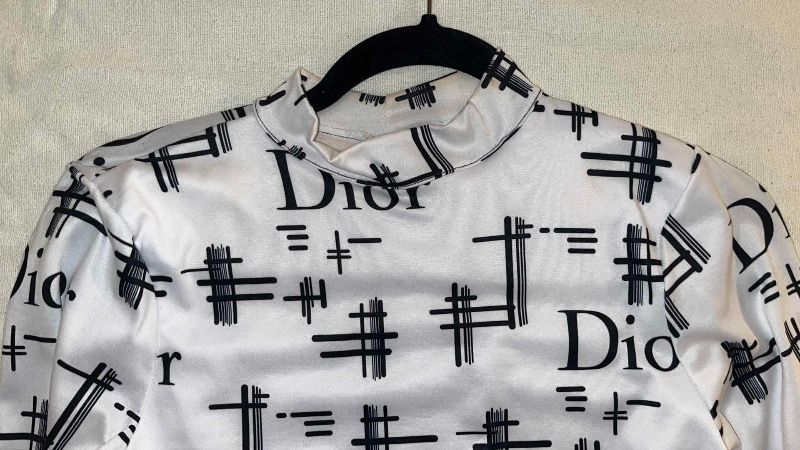 Photo 1 of  DIOR LONG SLEEVE BODYSUIT (SIZE M)