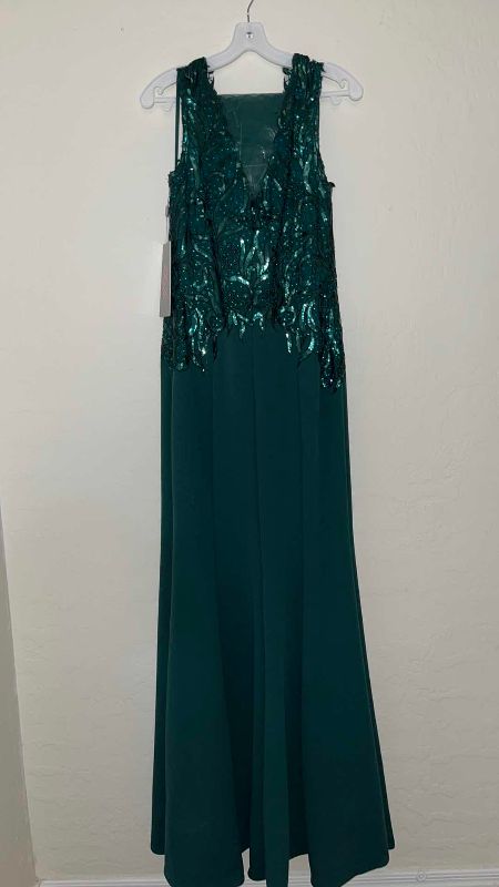 Photo 1 of LET’S PARTY GOWN SIZE MEDIUM