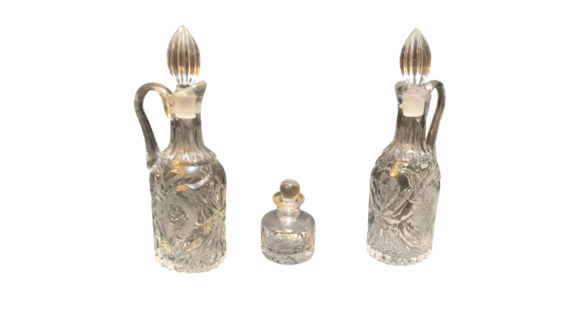 Photo 1 of 2-CRYSTAL CRUETTES AND A CRYSTAL PERFUME BOTTLE