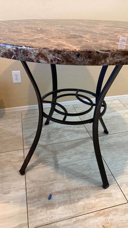 Photo 1 of FAUX MARBLE AND METAL DINING TABLE 42” CIRCUMFERENCE H 36”