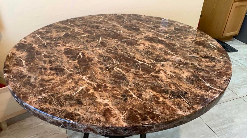 Photo 1 of FAUX MARBLE AND METAL DINING TABLE 42” CIRCUMFERENCE H 36”