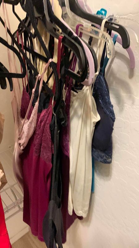 Photo 1 of WOMENS BRAS AND LINGERE TOPS SIZE M AND L