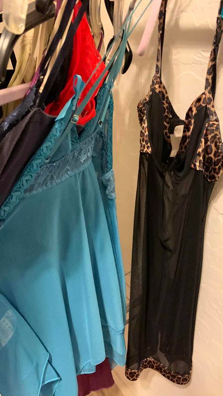 Photo 1 of WOMENS BRAS AND LINGERE TOPS SIZE M AND L