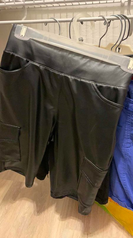 Photo 1 of WOMENS SHORTS SIZE M AND WRAPS
