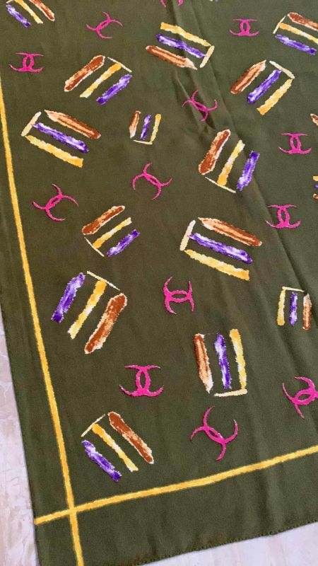 Photo 1 of FAUX CHANEL SCARF 60” X 19”